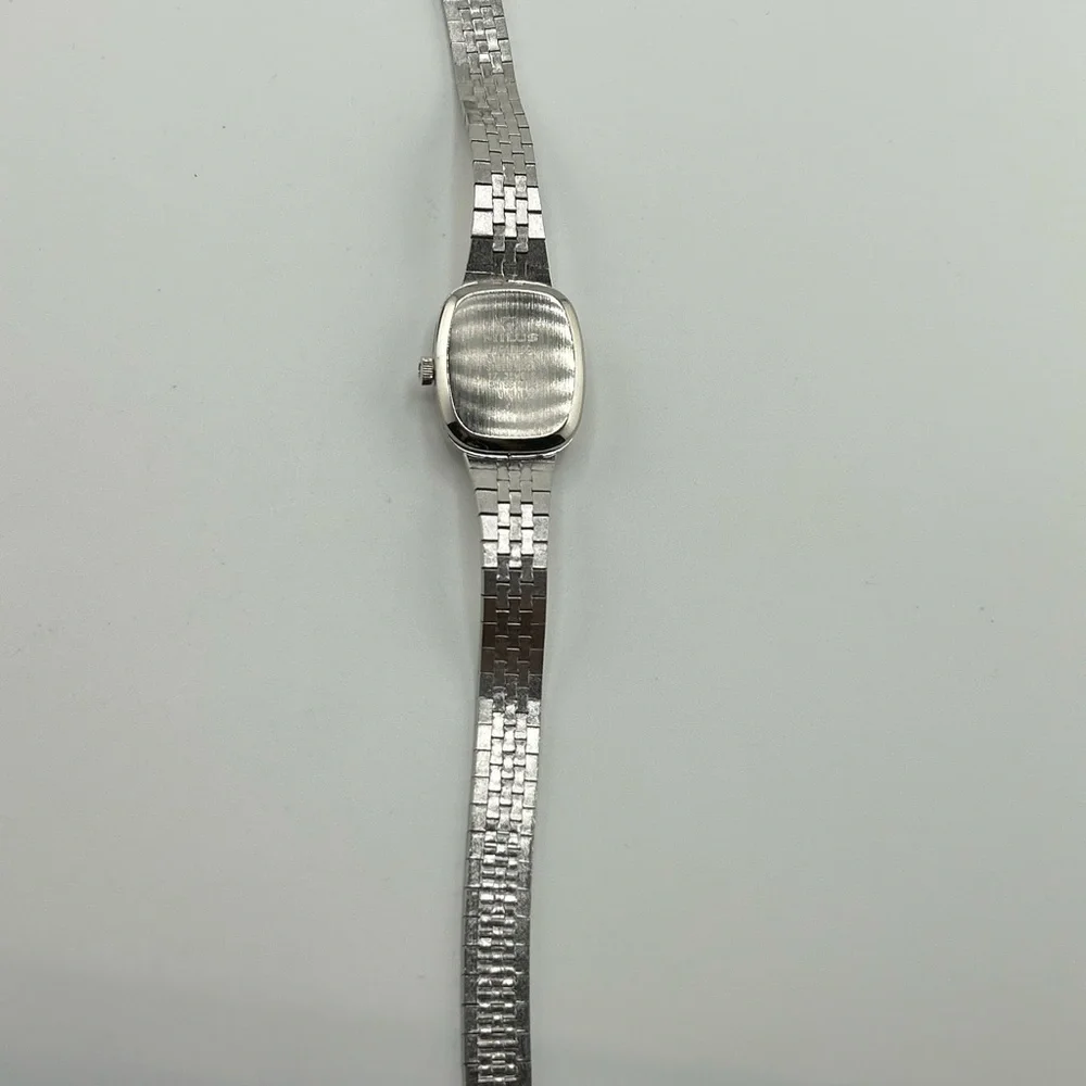 Milus vintage unisex Silver and Blue swiss made watch #566